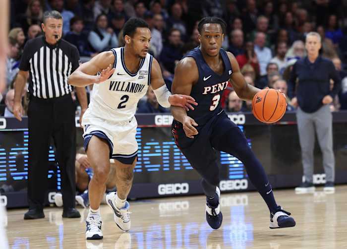 Pennsylvania Quakers guard Jordan Dingle (3) dribbles against Villanova Wildcats guard Mark Armstrong (2) during the first half at William B. Finneran Pavilion.